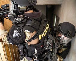 SWAT Team wearing the MIRA Safety CM-6M Tactical Gas Mask